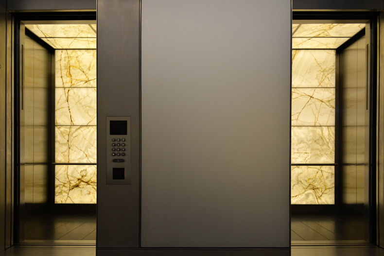 Backlit Onyx Elevator Cabs