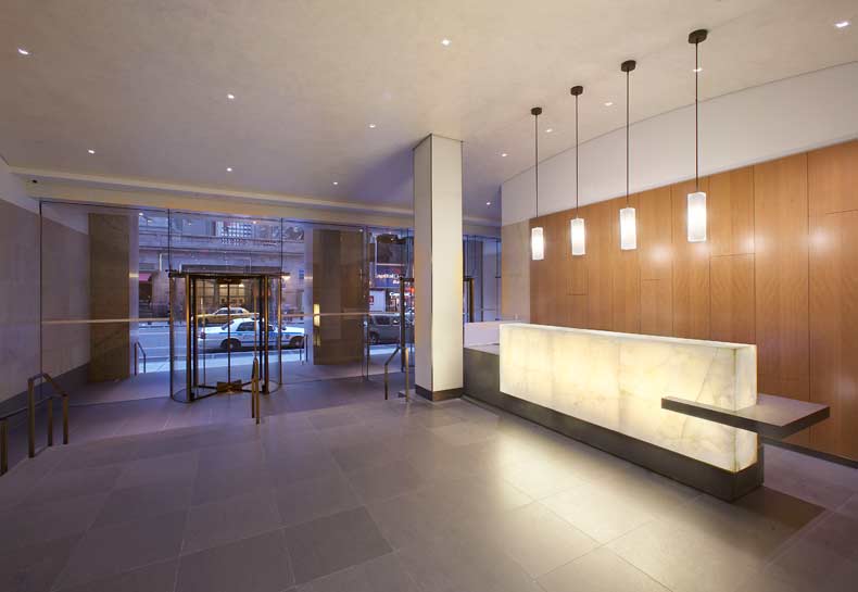 Backlit-Onyx-Reception-Desk-125-Park-Ave