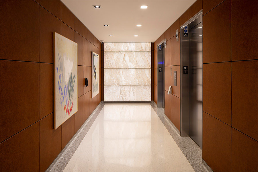 Backlit Onyx Interior + Exterior Lobby Walls