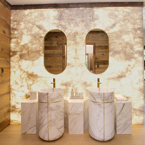 Backlit Stone Shower and Vanity Walls