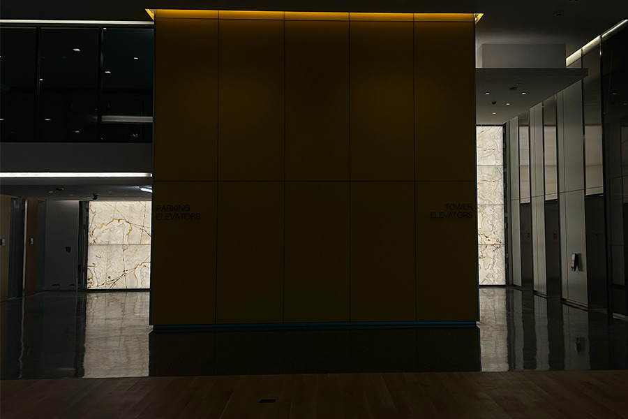 Backlit Stone Garage + Elevator Lobby End Walls