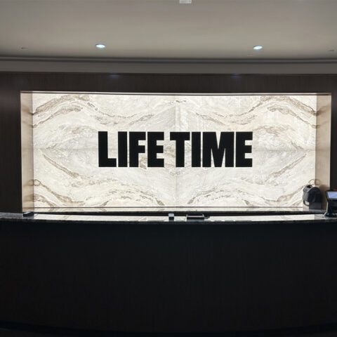 Backlit Reception Desk Feature Wall
