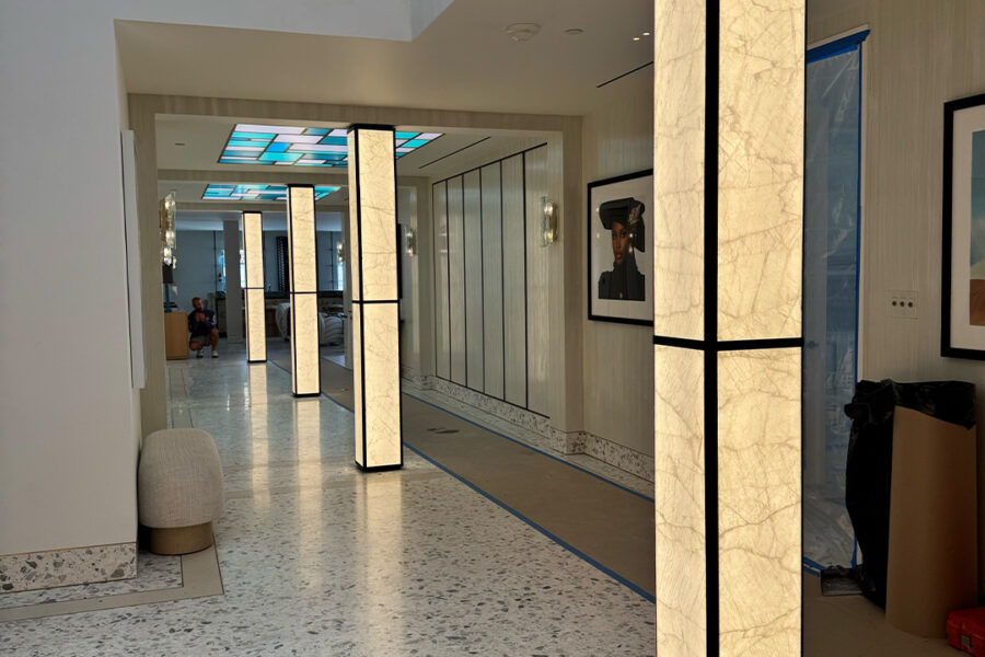 Four Glass Backed Illuminated Columns