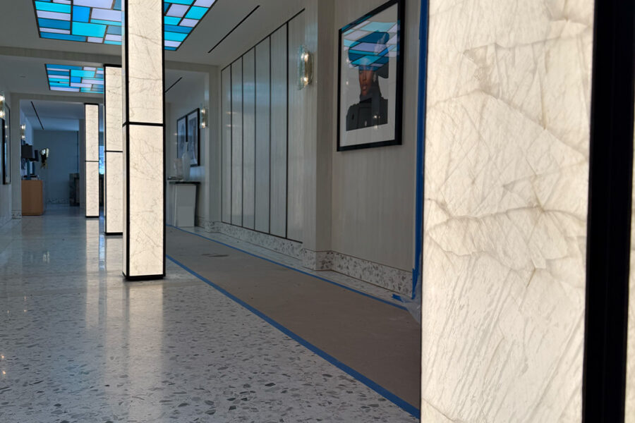 Four Glass Backed Illuminated Columns