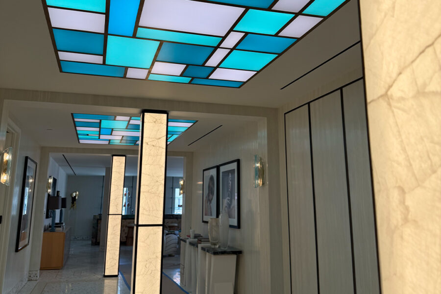 Four Glass Backed Illuminated Columns
